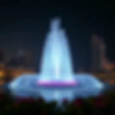 Night Illumination of Address Fountain Address Fountain illuminated at night with city skyline in the background