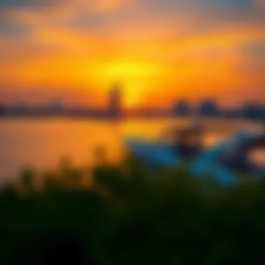 Beautiful sunset over the Arabian Gulf with city reflections