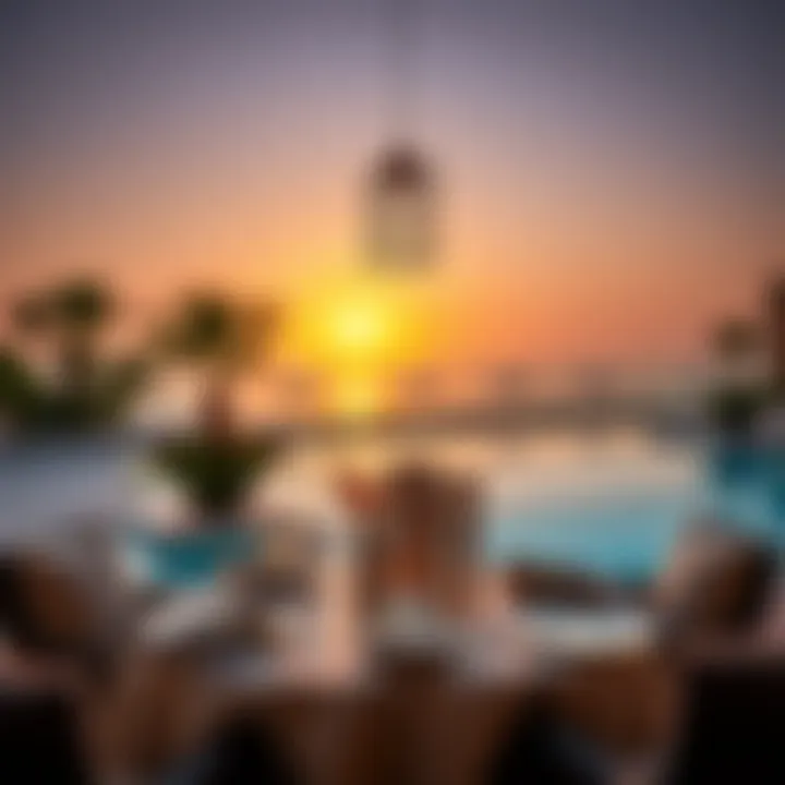 An exquisite dining setup by a private pool with beautiful sunset views