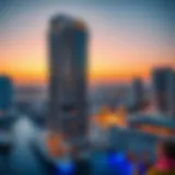 Stunning exterior view of Orra Marina Tower against sunset