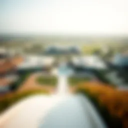 A panoramic view of a luxurious Dubai ranch showcasing its vast greenery and modern architecture
