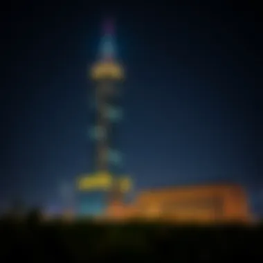 Illuminated Tower at Night Night view of Abdullah Al Shaiba Tower illuminated against the Dubai night sky