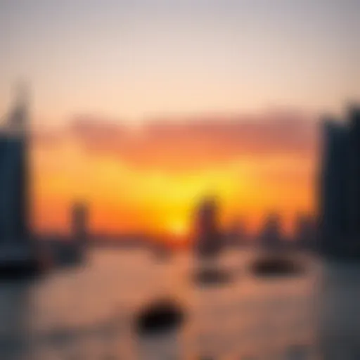 Panoramic view of Dubai Marina at sunset with dhows sailing