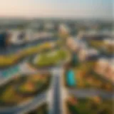 Aerial view of the Golf Promenade showcasing its lush green spaces and luxurious properties