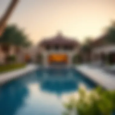 Relaxing Poolside at The Manor Serene swimming pool area surrounded by lush landscaping at The Manor
