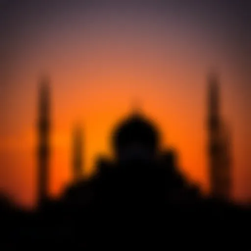 Majestic mosque silhouette at sunset